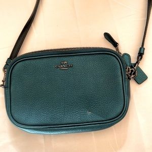 Metallic coach teal bag.